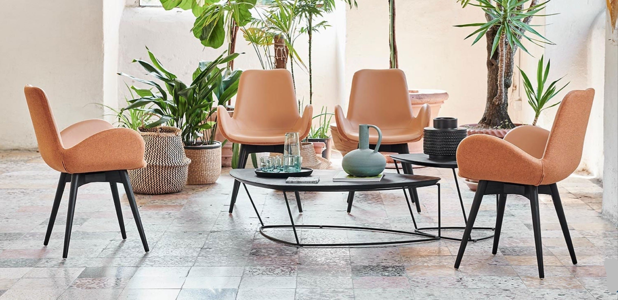 modern dining chairs in orange upholstery