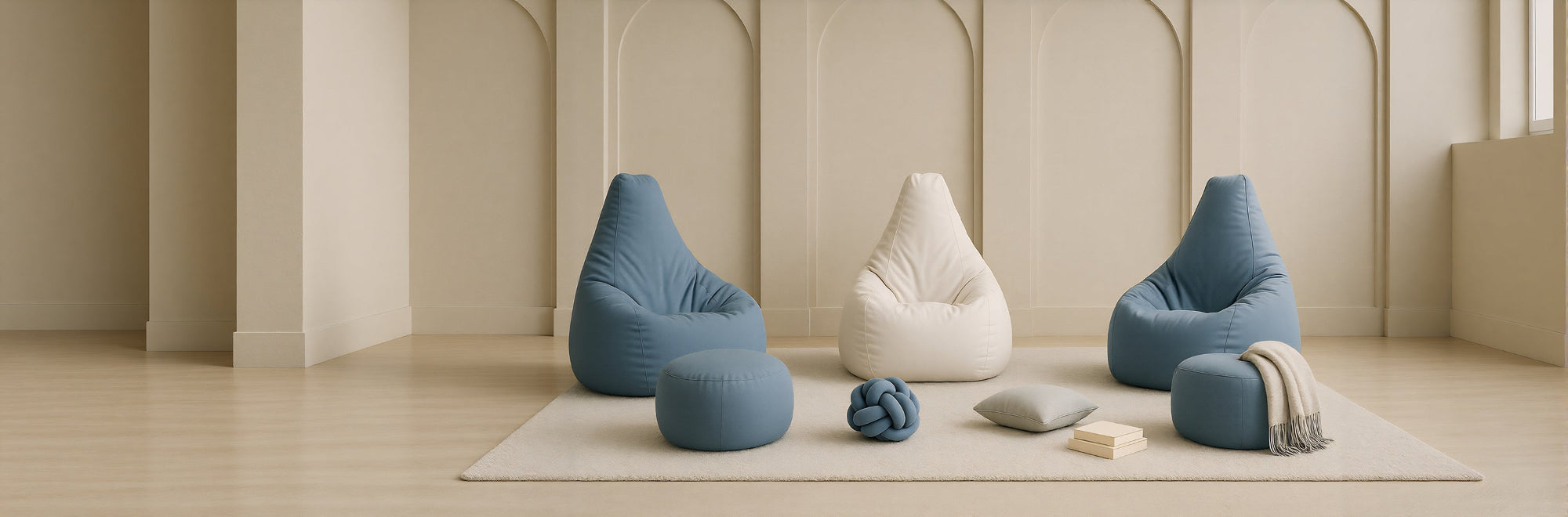Set of bean bags in various shapes and colors on a beige rug in a minimalistic room.