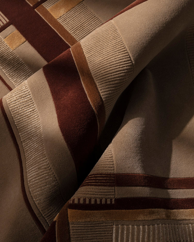 Volver Ruter Patterned rug with brown and beige colors