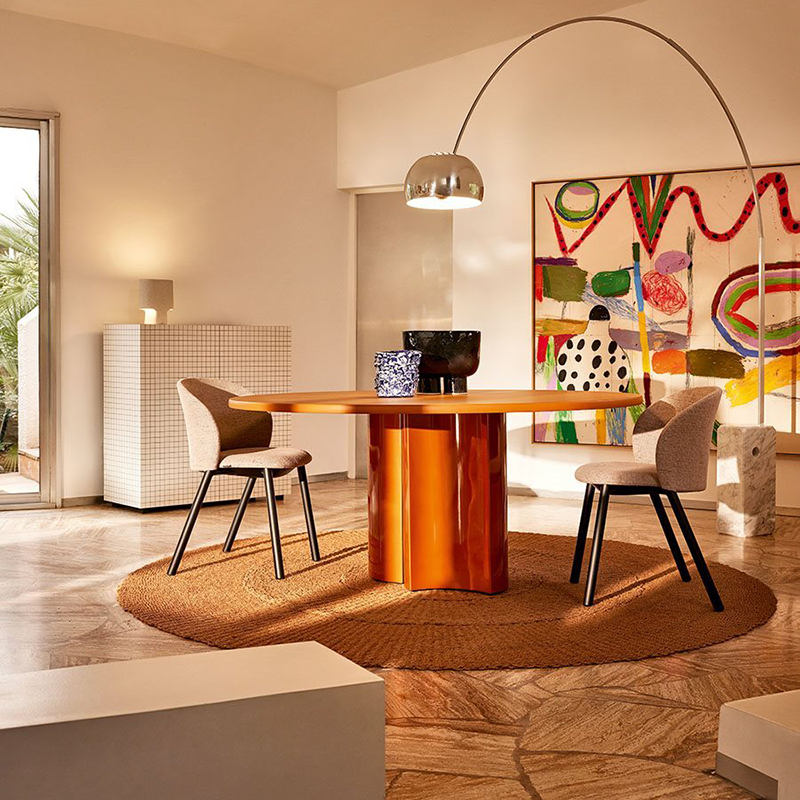 Bol dining table in orange lacquer and chairs