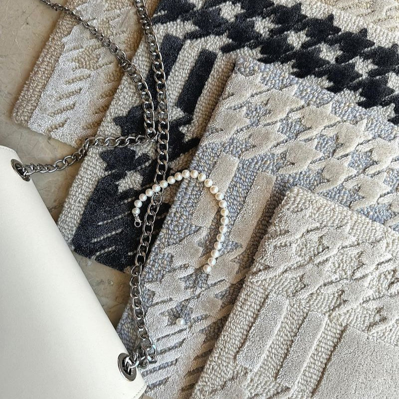 set of chanel inspired modern area rugs by luxury furniture brands