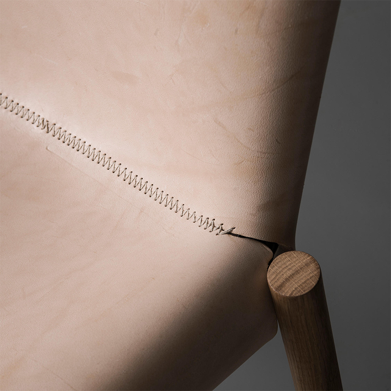 Closeup details of Natural 1085 Edition Leather Chair by Kristalia