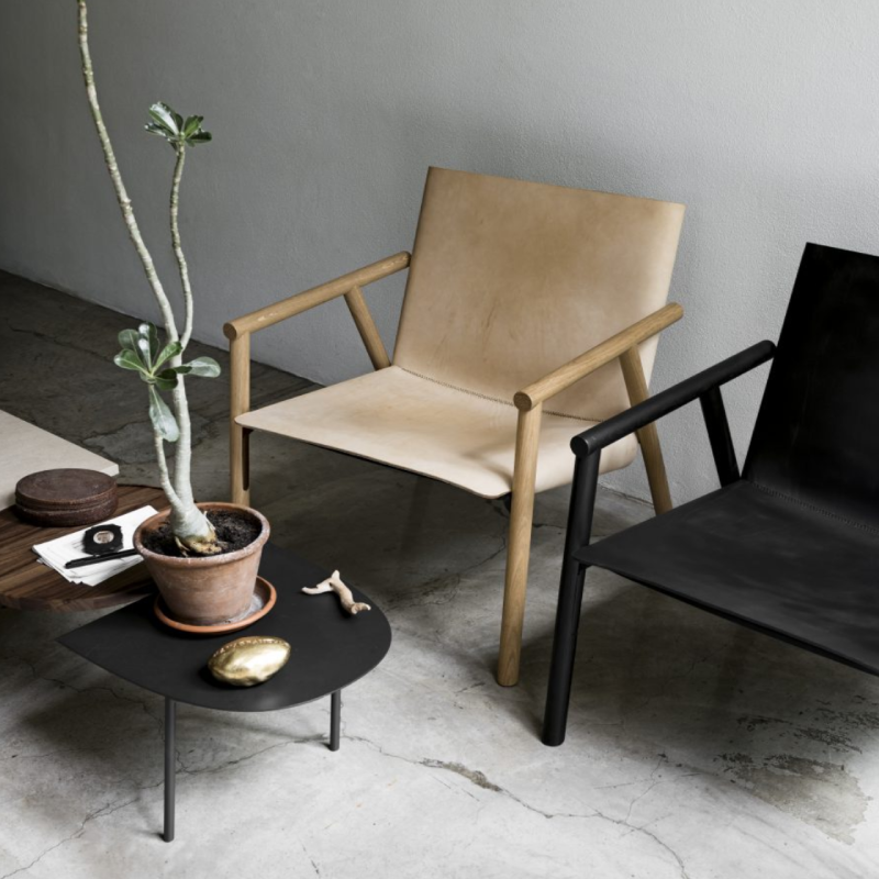 1085 Edition Lounge Armchairs in black and natural leather by Italian brand Kristalia