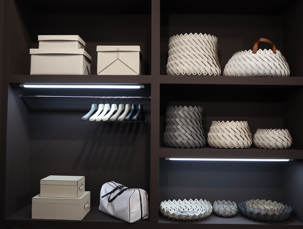 pinetti baskets on shelves in wardrobe