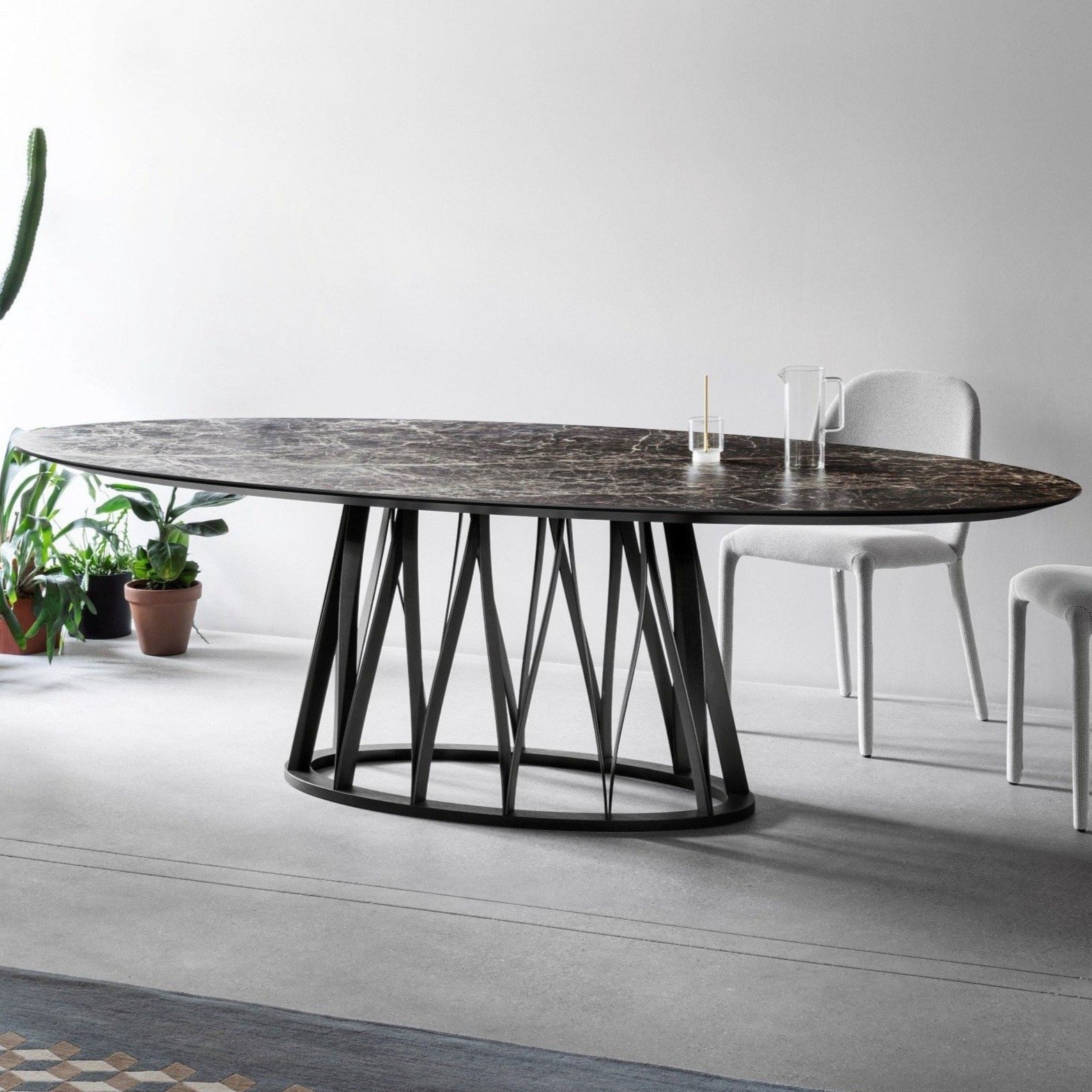 Round ceramic Acco Dining Table by Italian brand Miniforms