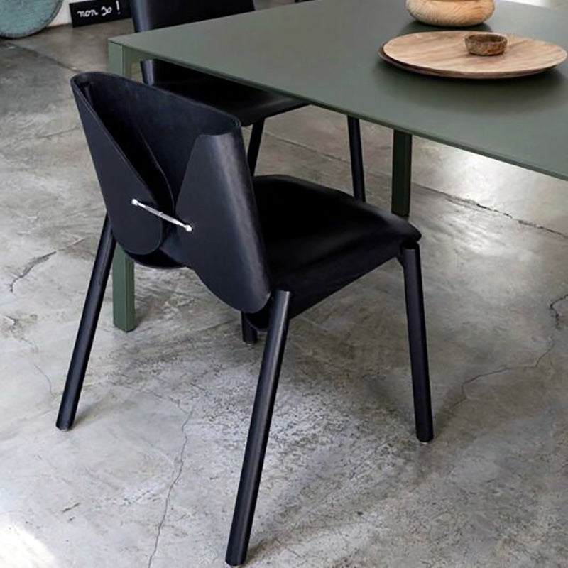 1085 Edition Chairs in black Leather at table by Kristalia