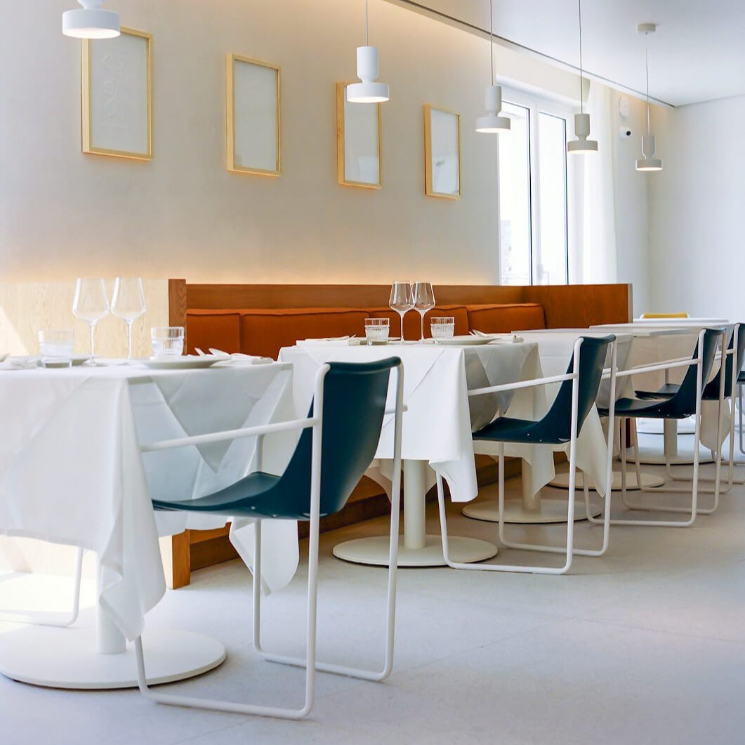 blue Apelle leather armchairs by Italian brand Midj in restaurant