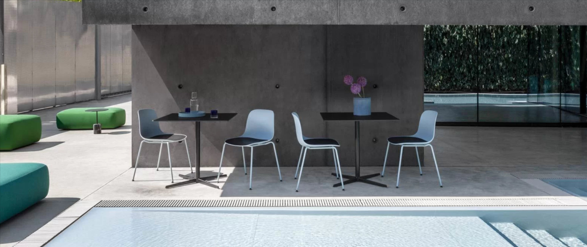 outdoor plastic chairs near pool