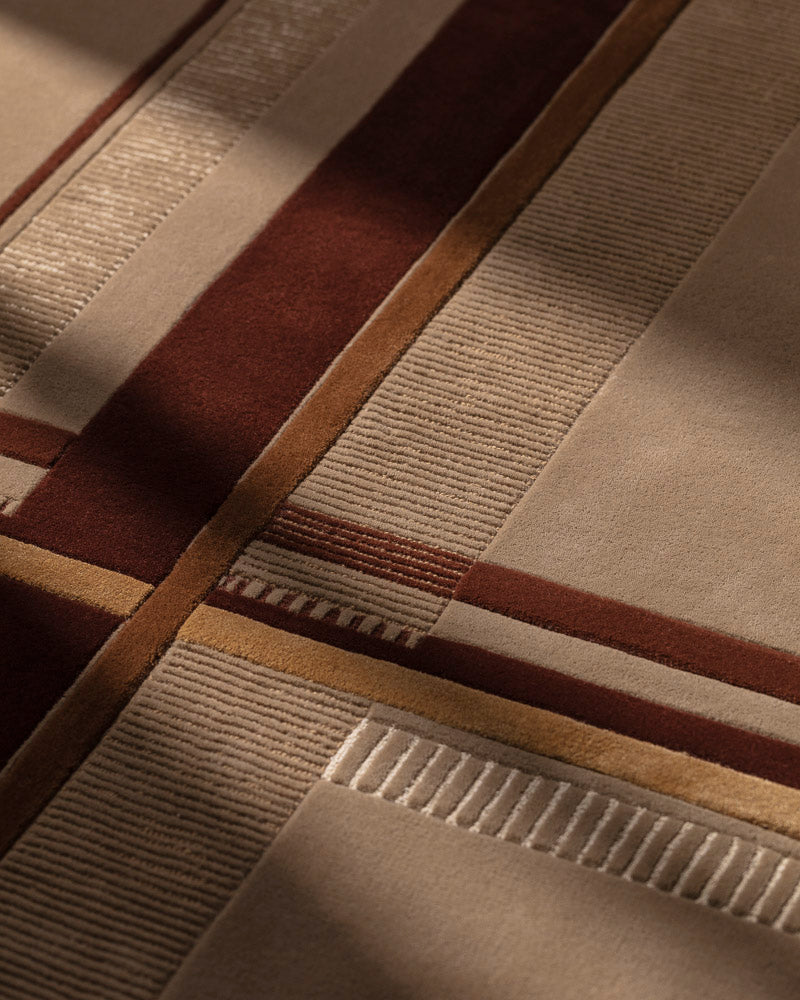 Volver Ruter Patterned rug with brown and beige colors