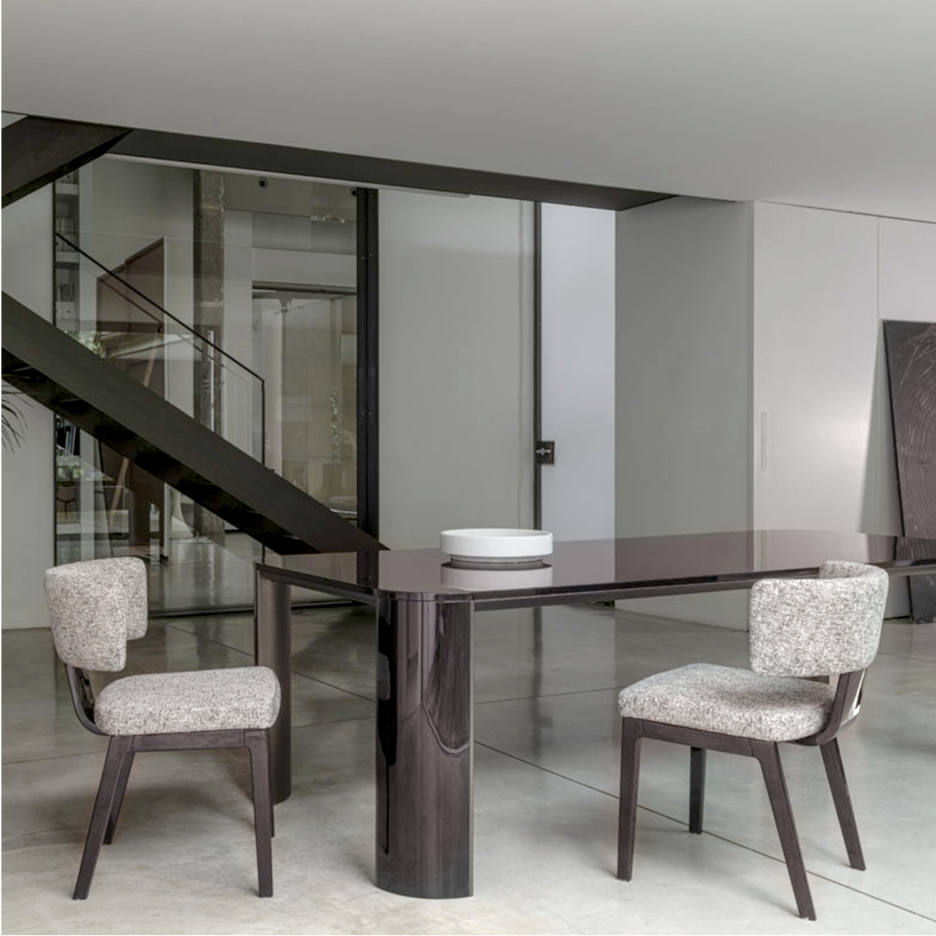 Otto Chairs and Eye Table by Italian brand costantini